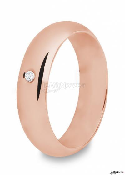 Fede classica in oro rosa con diamante