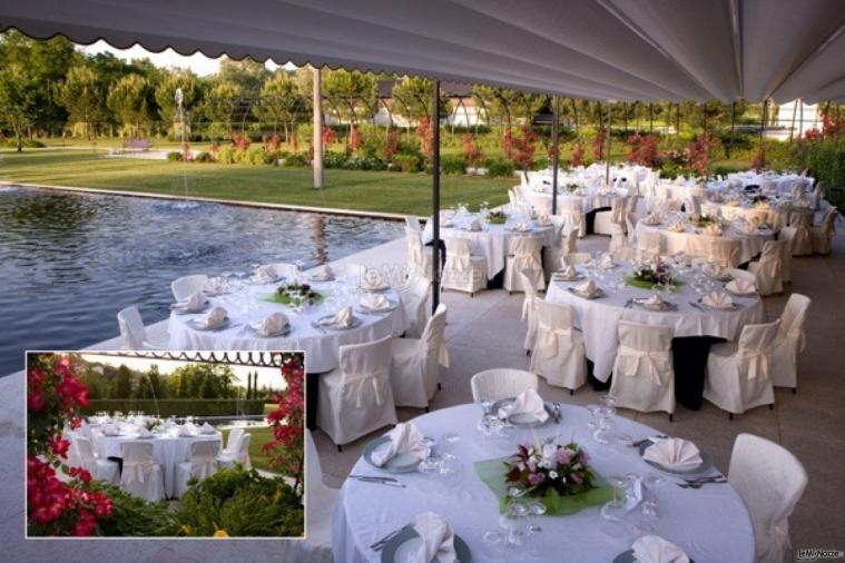 Tavoli a bordo piscina - Ristorante Alla Pergola da Piero