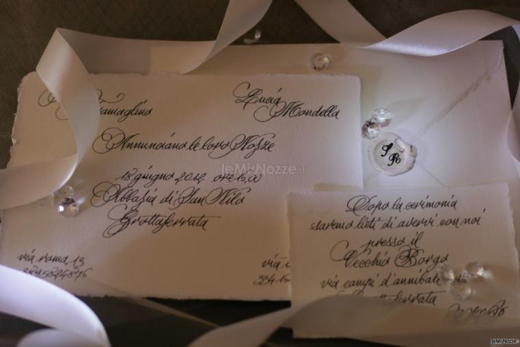 Partecipazione di matrimonio con scrittura eseguita a mano