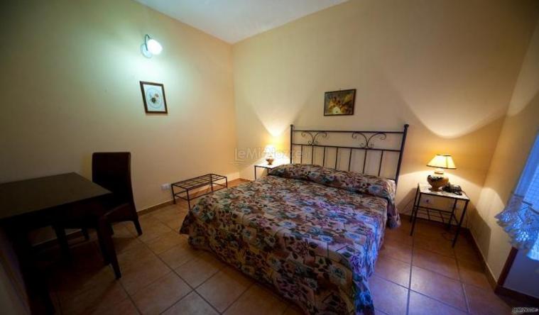 Camera da letto per prima notte di nozze presso l'agriturismo Masseria Rocca di Gonato