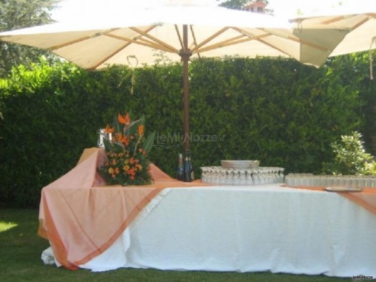 Allestimento per il ricevimento di matrimonio in giardino