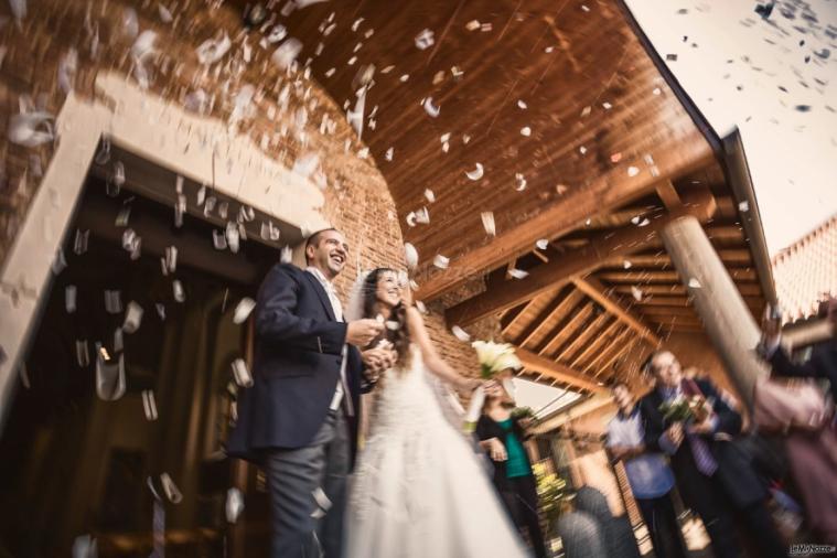 NLL Matrimoni - Foto sposi che escono dalla chiesa