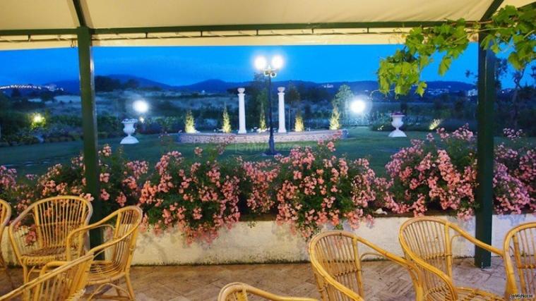 Veranda dalla quale si vede la fontana della villa