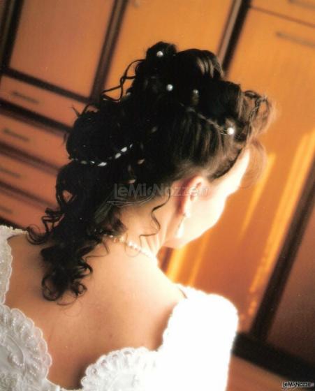 Acconciatura sposa semi raccolta