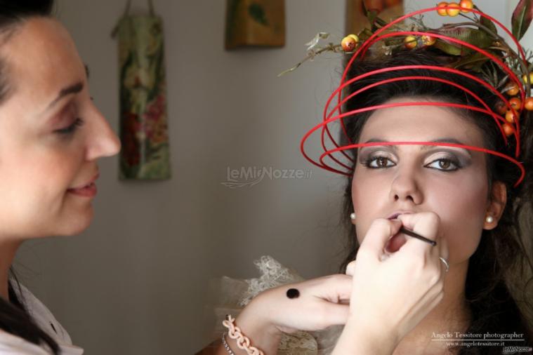 Trucco sui toni dell'arancio per la sposa